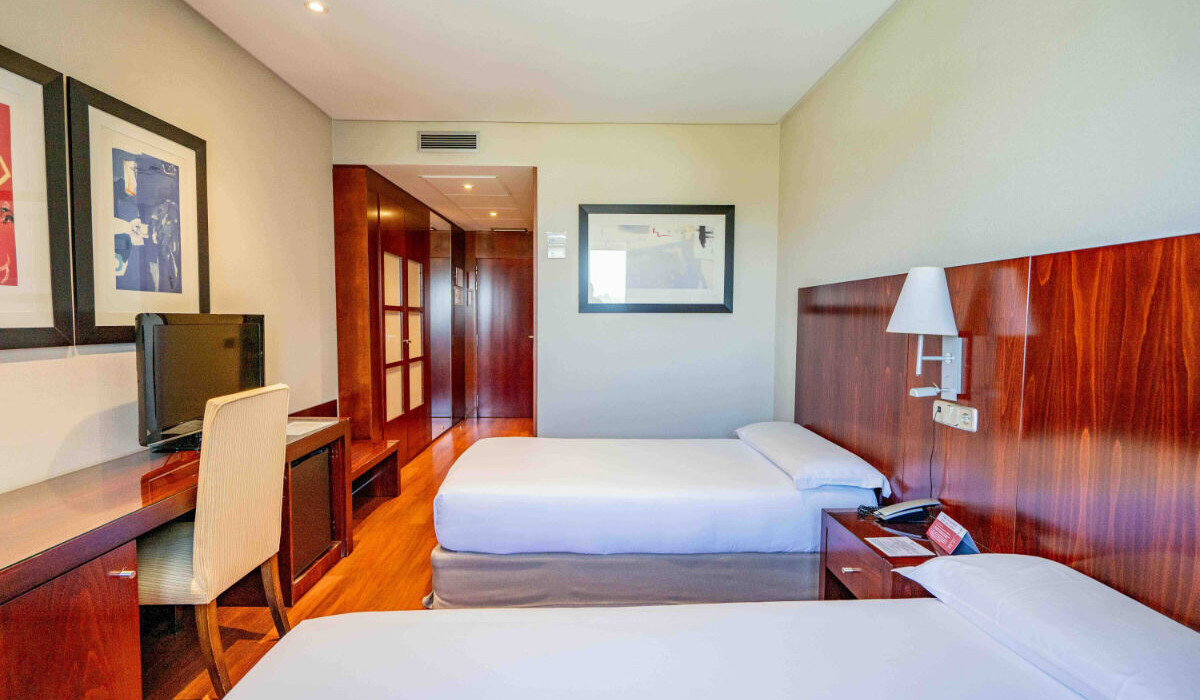 Habitación con camas twin en uno de nuestros hoteles Attica21.